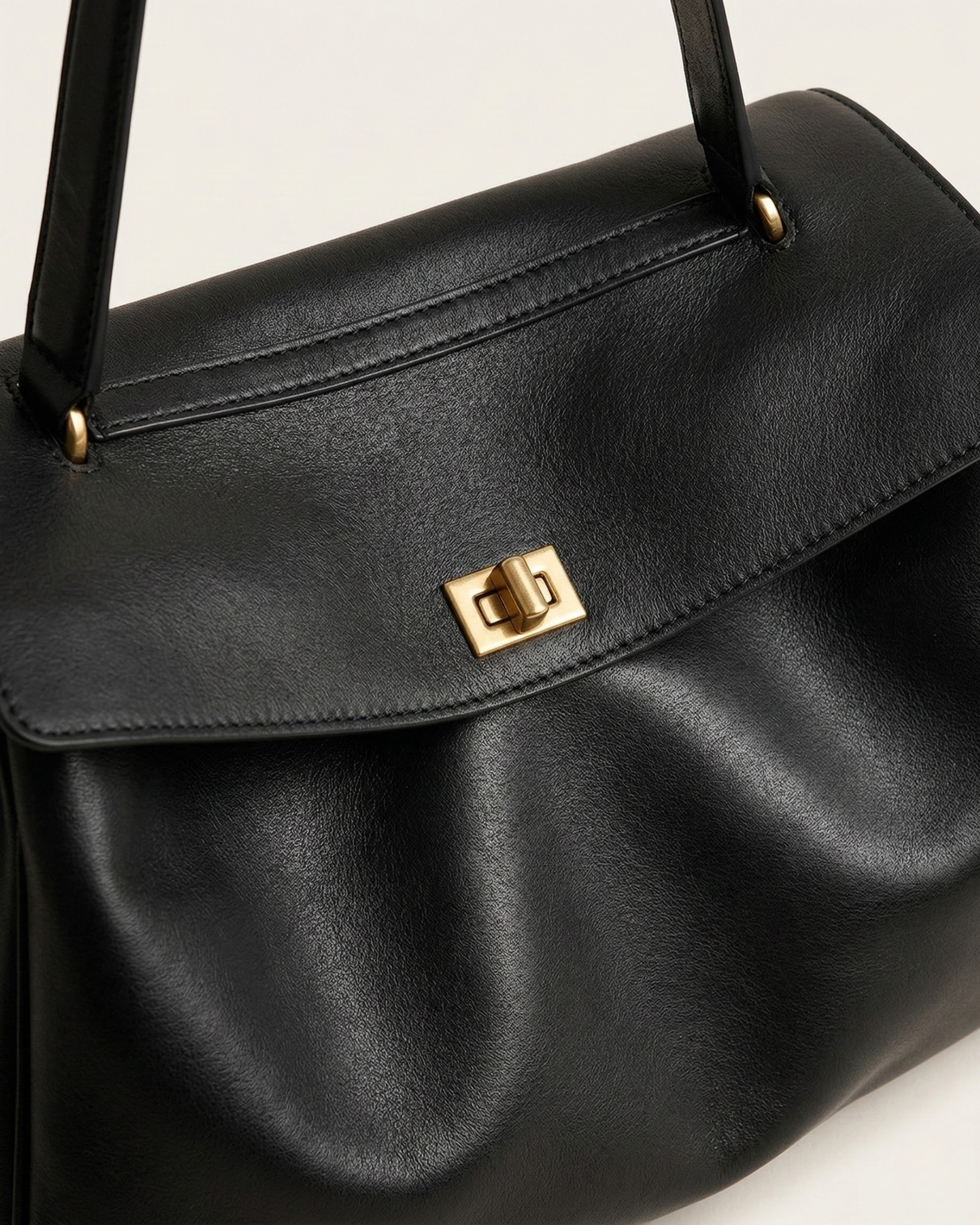 The Geneva Top-Handle